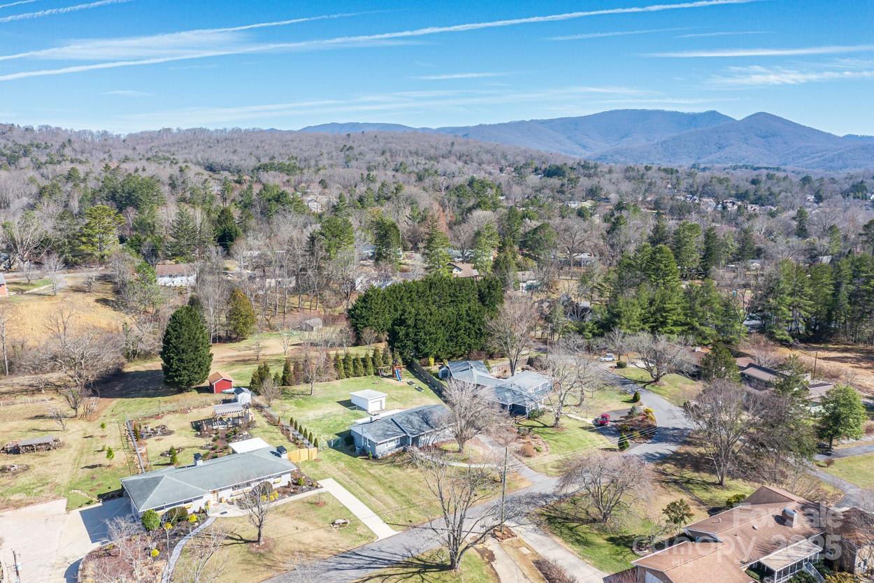 29 Willowbrook Road, Unit 11 Asheville, NC 28805 - Photo 46 of 46 a view of a city with mountains