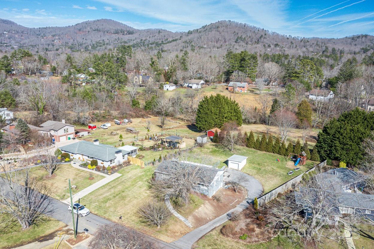 29 Willowbrook Road, Unit 11 Asheville, NC 28805 - Photo 7 of 46 a view of a house with a mountain