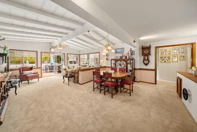 a bedroom with a bed and ceiling fan