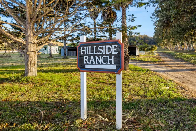 a sign on the side of the road