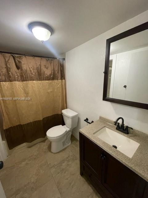 180 Royal Palm Road, Unit 109 Hialeah Gardens, FL 33016 - Photo 11 of 11 a bathroom with a sink and a mirror