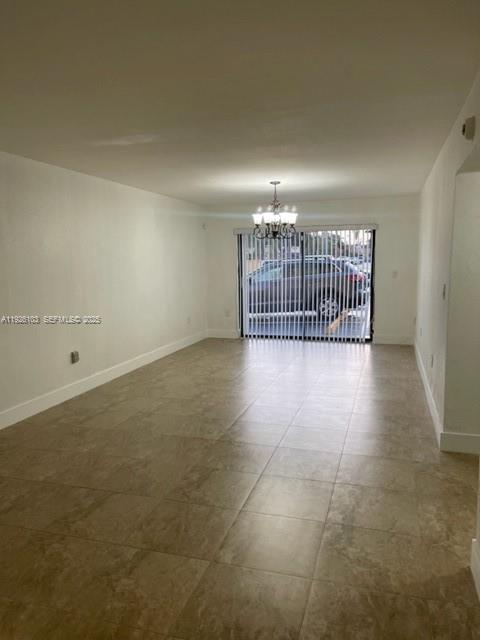 180 Royal Palm Road, Unit 109 Hialeah Gardens, FL 33016 - Photo 4 of 11 a view of livingroom with stairs
