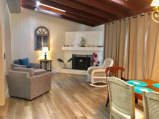 1831 Wheeler Road North Palm Beach, FL 33408 - Photo 2 of 22 Dining Room/Fireplace