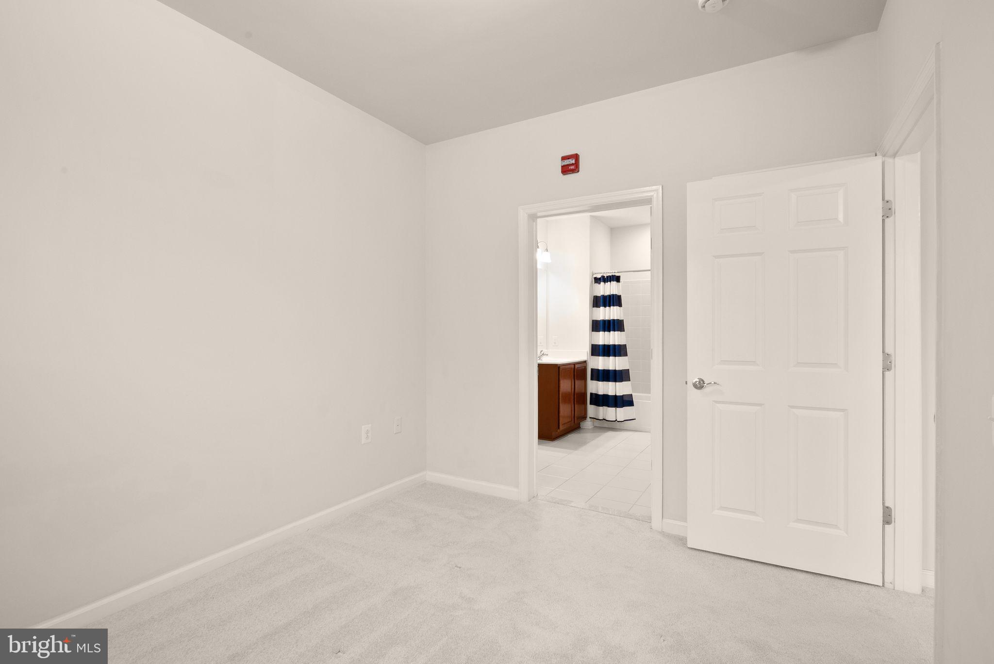 20610 Hope Spring Terrace, Unit 104 Ashburn, VA 20147 - Photo 19 of 38 Bedroom