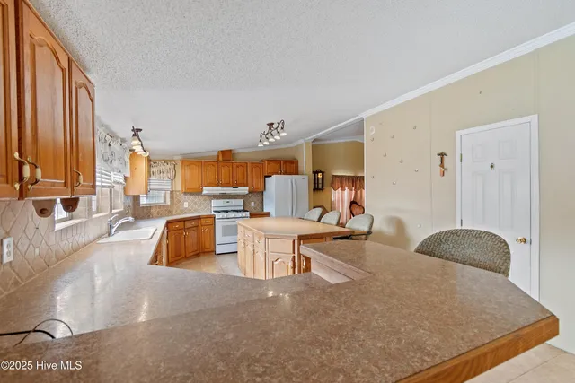 $350,000 | 1053 Belhaven Drive Southwest, Supply, NC 28462