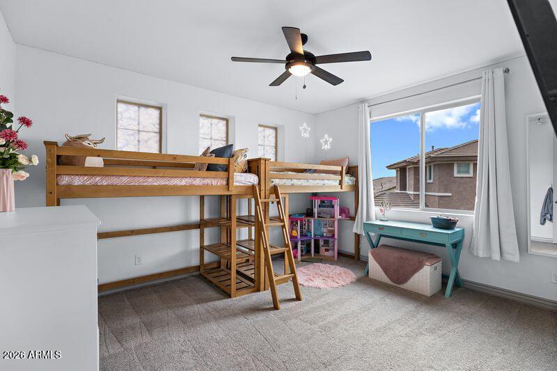 7871 South Stuart Avenue Gilbert, AZ 85298 - Photo 26 of 77 a view of a room with furniture and a ceiling fan