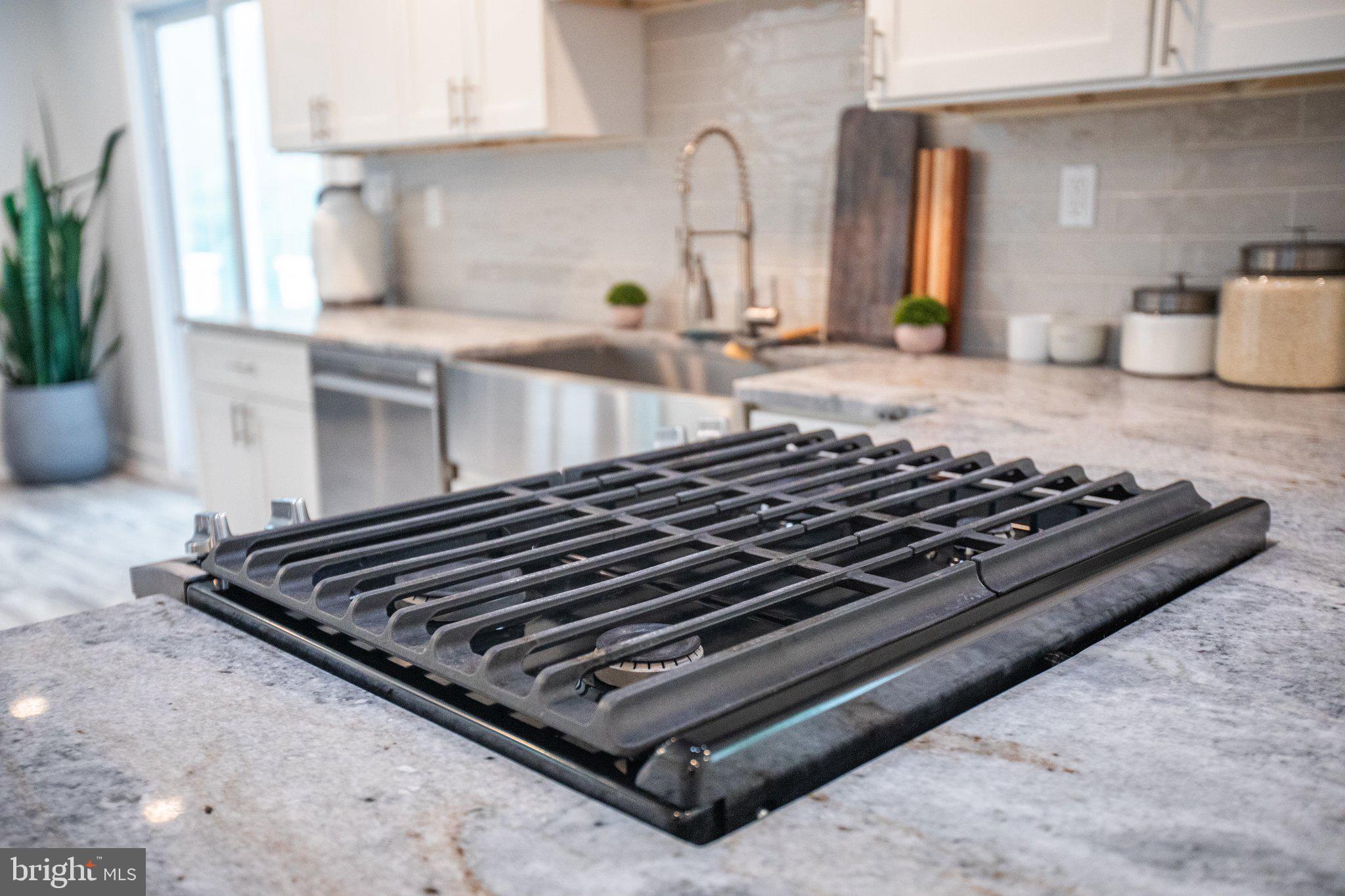 80 Cranford Road Blackwood, NJ 08012 - Photo 24 of 53 Sleek gas cooktop on elegant countertop.