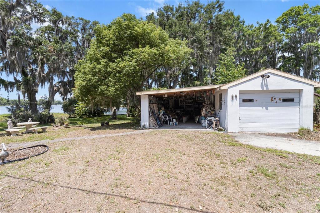 1226 South Telephone Point Road Inverness, FL 34450 - Photo 35 of 43 a front view of a house with a yard