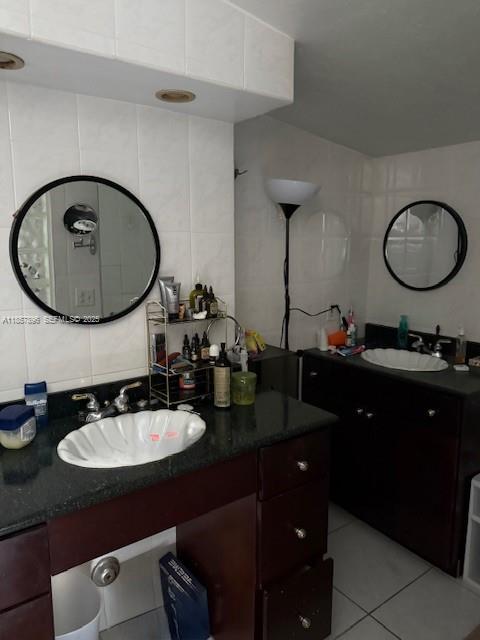 8950 Southwest 197th Street Cutler Bay, FL 33157 - Photo 11 of 15 a bathroom with a double vanity sink and a mirror