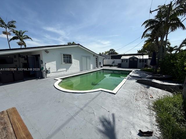 8950 Southwest 197th Street Cutler Bay, FL 33157 - Photo 13 of 15 a view of a backyard with a patio