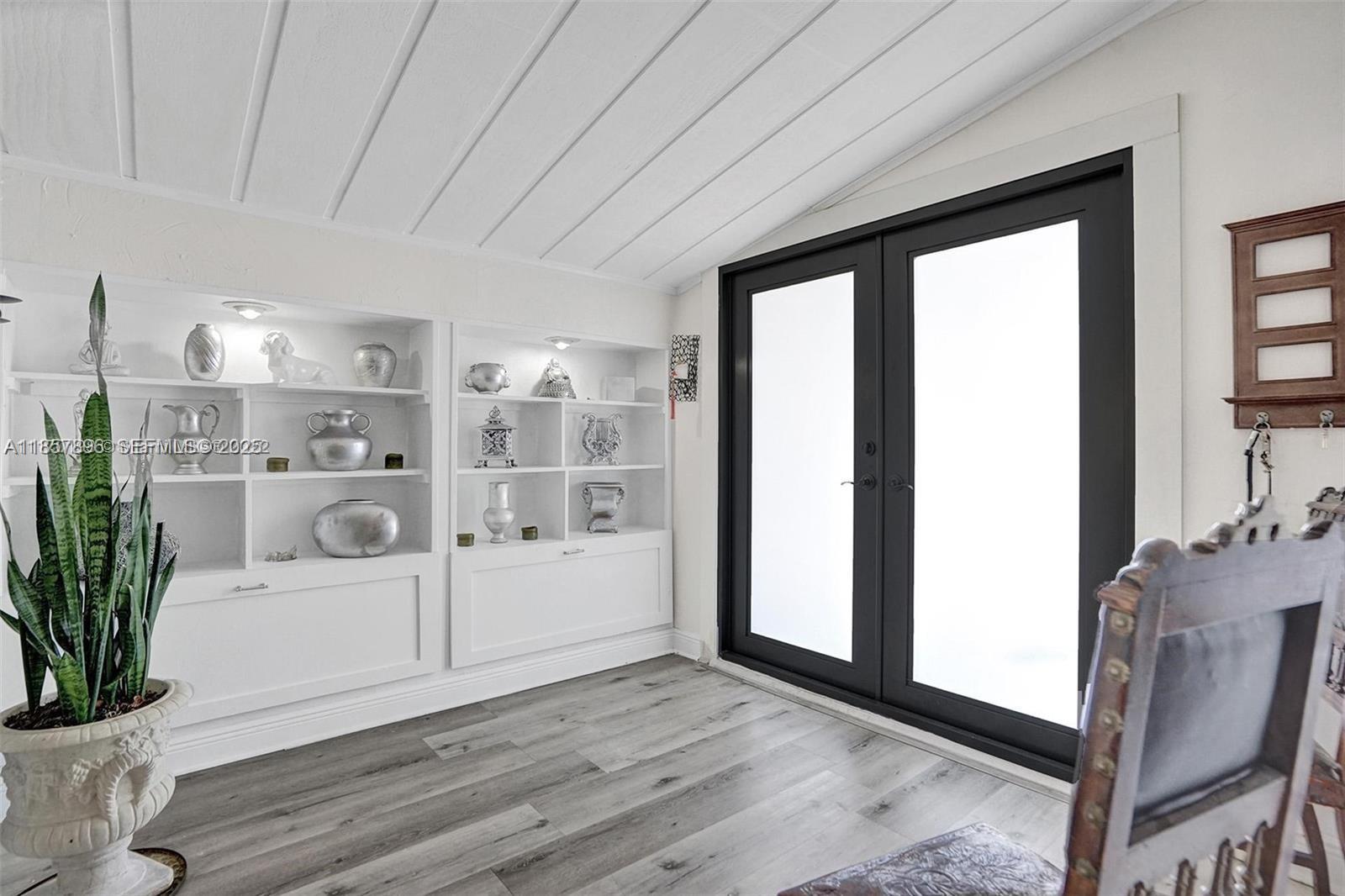 8950 Southwest 197th Street Cutler Bay, FL 33157 - Photo 2 of 15 a view of an empty room with a window