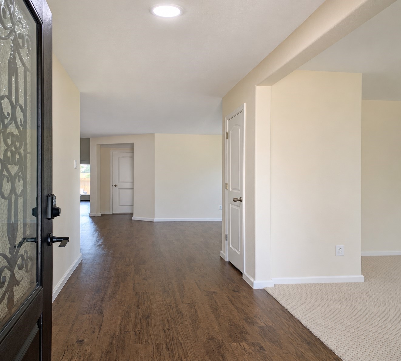 5612 Rainflower Terrace Lane Spring, TX 77389 - Photo 4 of 50 a view of a room with wooden floor and a window
