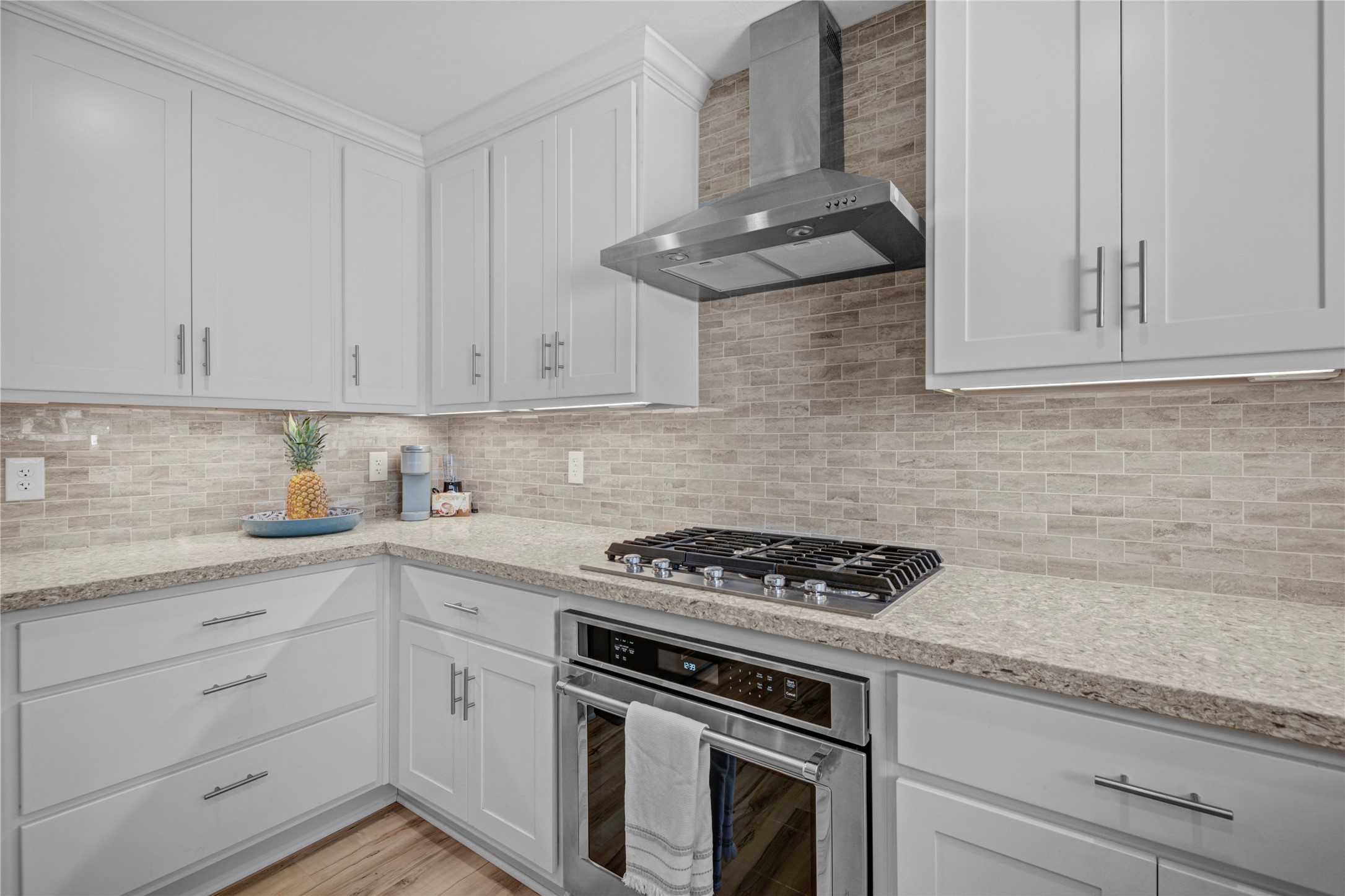 6711 River Lodge Drive Spring, TX 77379 - Photo 13 of 39 a kitchen with white cabinets and appliances