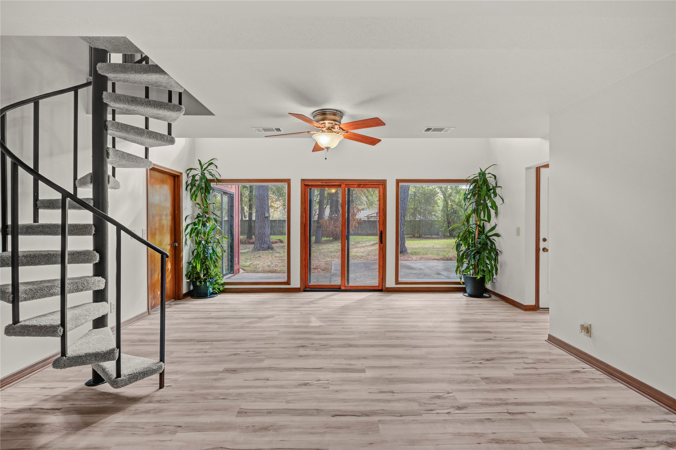 6711 River Lodge Drive Spring, TX 77379 - Photo 15 of 39 wooden floor in an empty room with a window