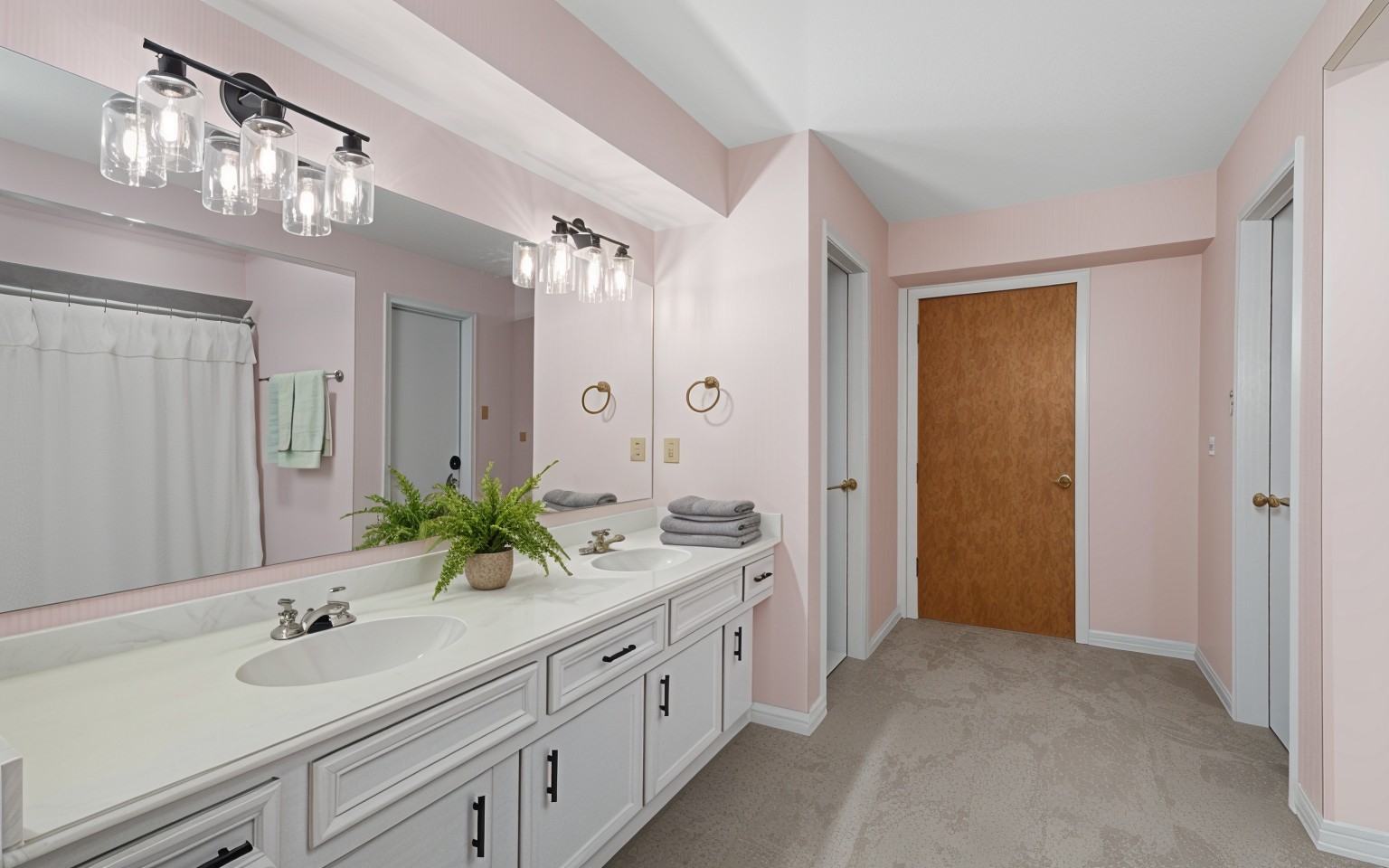 6711 River Lodge Drive Spring, TX 77379 - Photo 24 of 39 a spacious en suite bathroom with a sink and a mirror