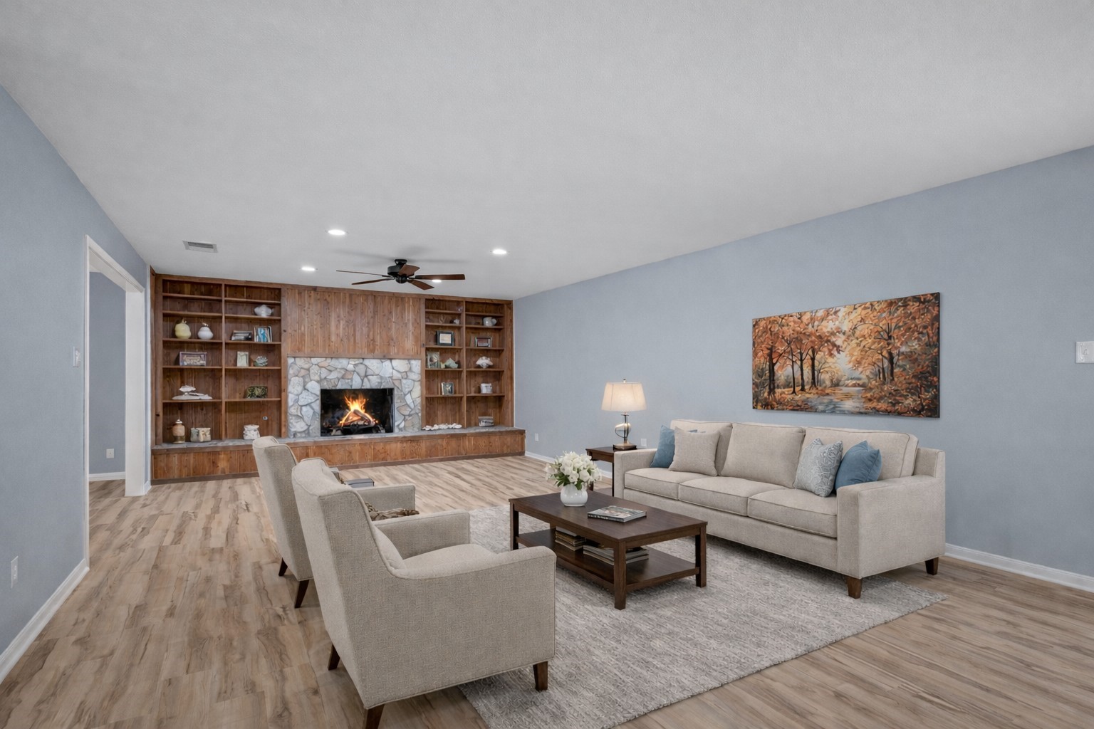 6711 River Lodge Drive Spring, TX 77379 - Photo 6 of 39 a living room with furniture and a fireplace
