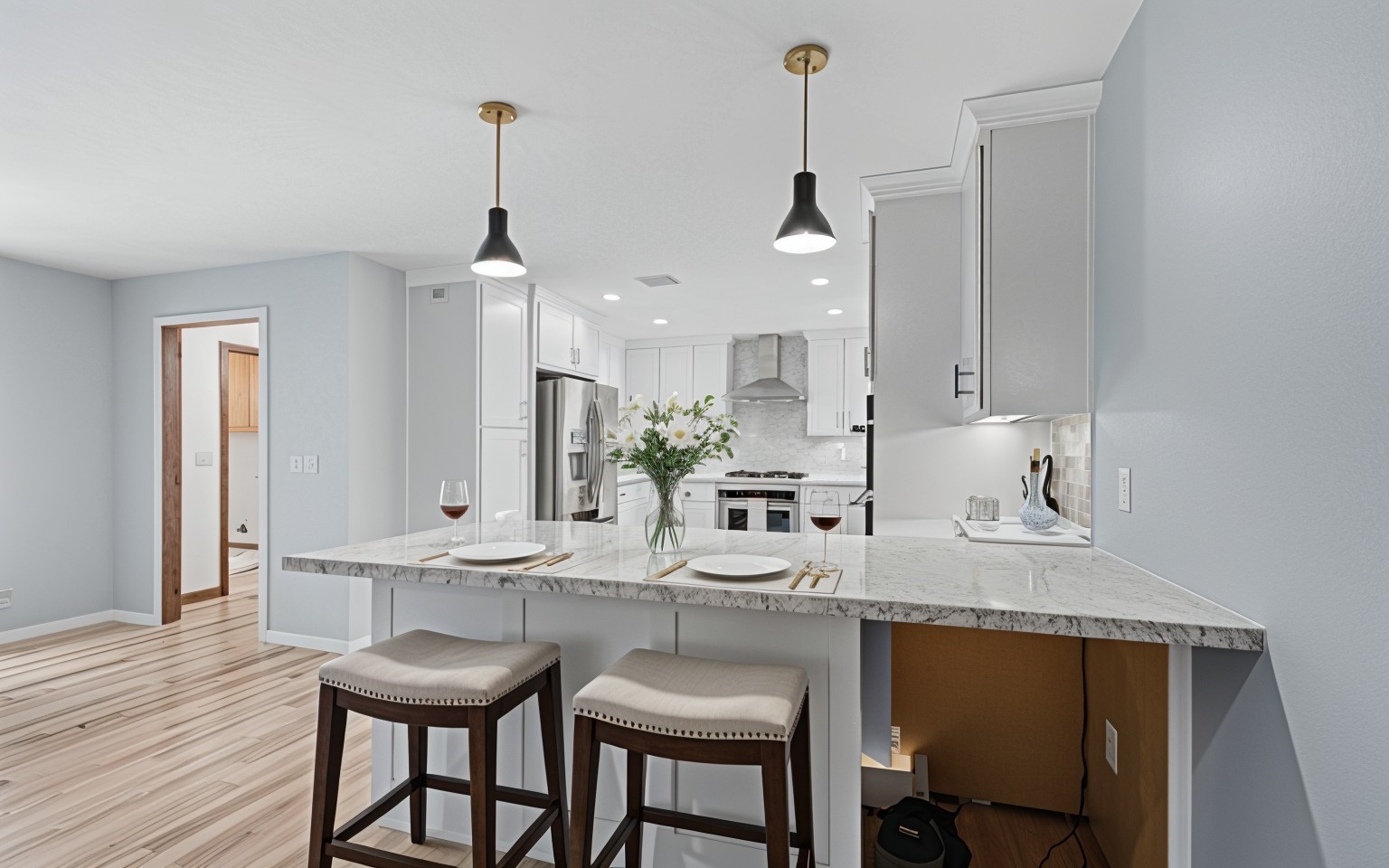 6711 River Lodge Drive Spring, TX 77379 - Photo 10 of 39 a kitchen with kitchen island granite countertop a sink a center island and cabinets