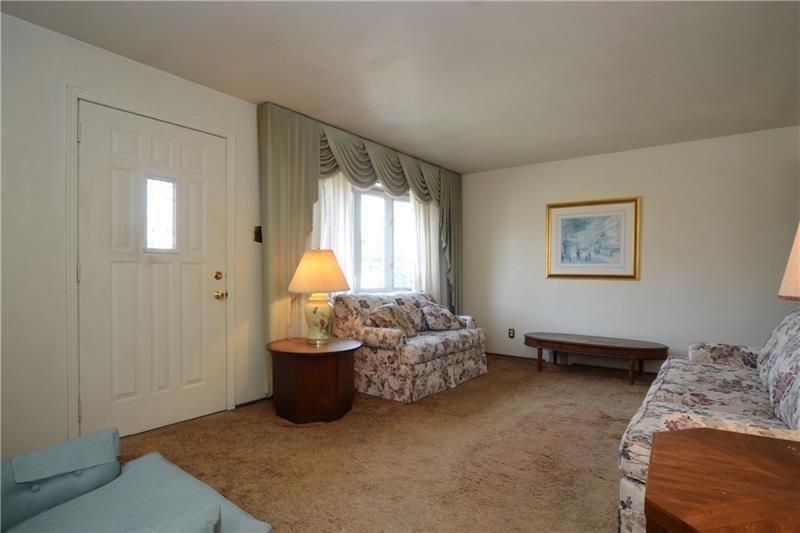 437 Ridgemont Drive Pittsburgh, PA 15220 - Photo 2 of 19 Carpet has been removed to reveal original hardwood