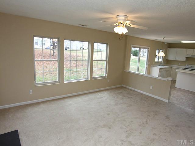 4109 Viewmont Drive Raleigh, NC 27610 - Photo 3 of 12 Another view of this spacious window-wrapped Family Room ( new carpet and freshly painted).