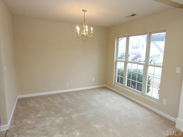 4109 Viewmont Drive Raleigh, NC 27610 - Photo 4 of 12 Chandeliered Dining Room for a family reunion!