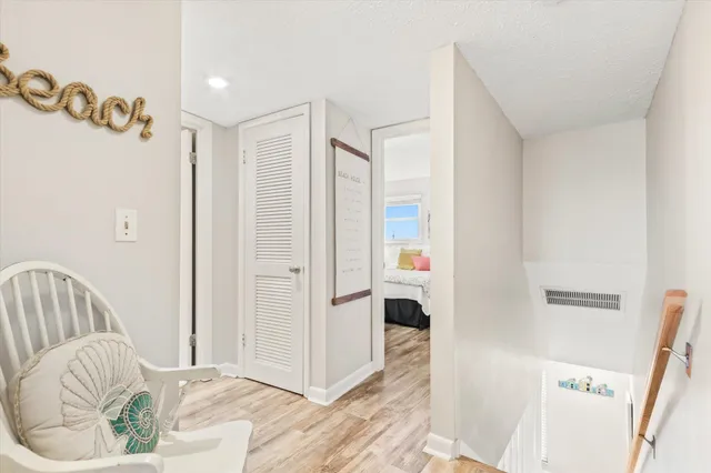 a view of a chairs and table in patio