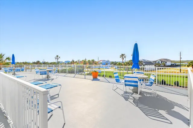 a view of a garden and an ocean