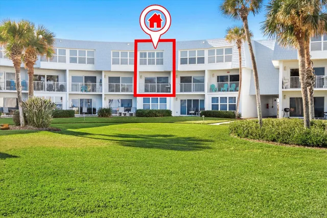 a view of a street with an ocean view