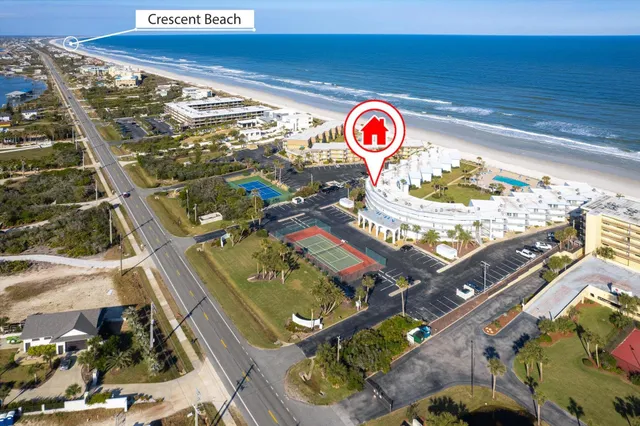 a view of a balcony with chairs
