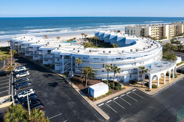 a view of a balcony with ocean view