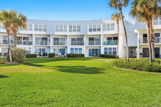 a view of a balcony with a ocean view