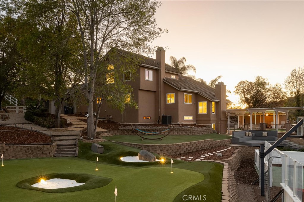 14026 Donart Drive Poway, CA 92064 - Photo 14 of 14 a view of a water fountain in front of the house