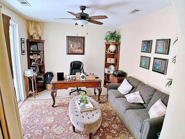 a view of a swimming pool with a lounge chairs