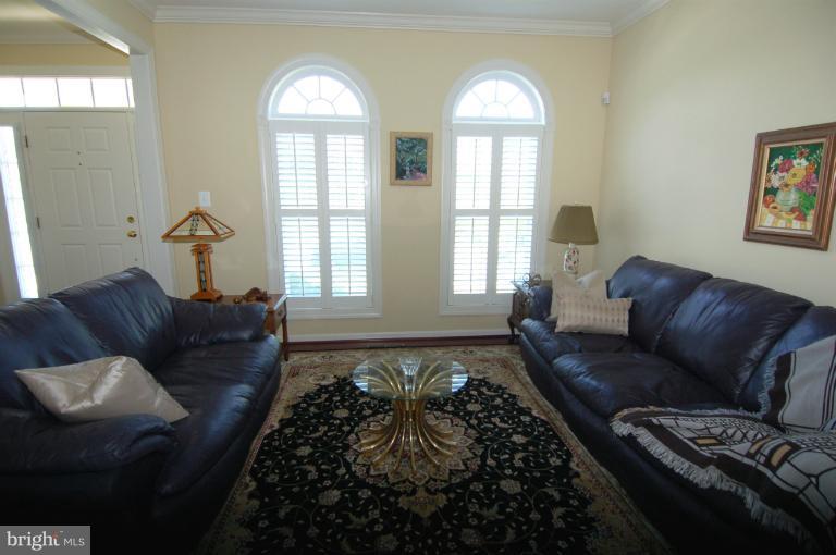 1309 Rome Court Odenton, MD 21113 - Photo 1 of 30 a living room with furniture and a large window