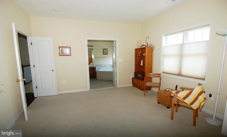 1309 Rome Court Odenton, MD 21113 - Photo 25 of 30 a bed room with a bed and furniture