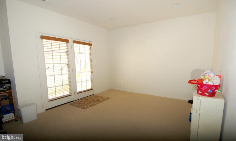 1309 Rome Court Odenton, MD 21113 - Photo 4 of 30 a view of an empty room with a window