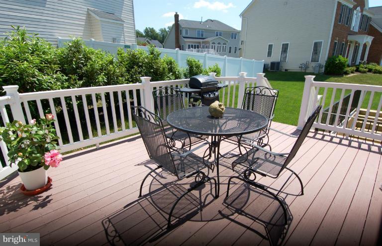1309 Rome Court Odenton, MD 21113 - Photo 5 of 30 a view of balcony with furniture and garden