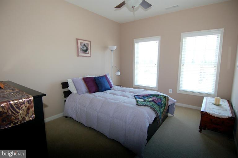 1309 Rome Court Odenton, MD 21113 - Photo 10 of 30 a bedroom with a bed and window