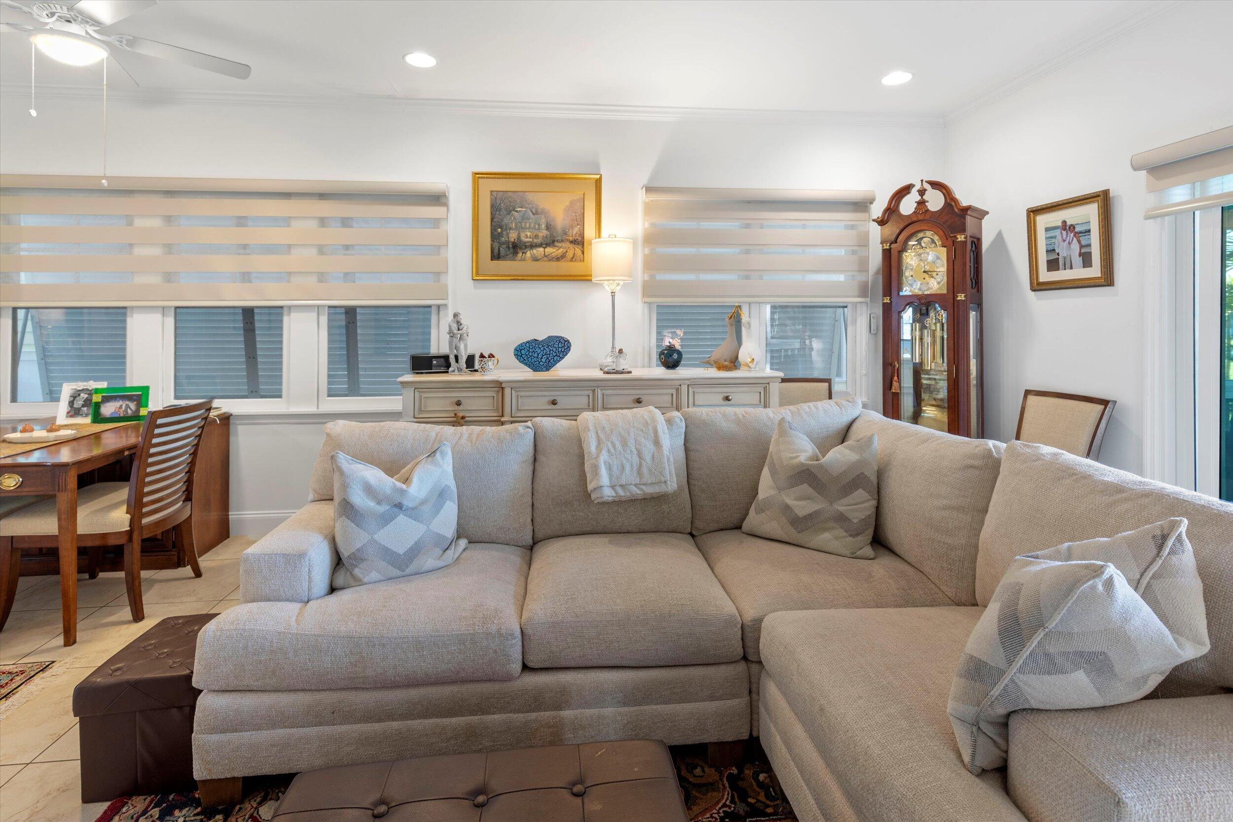 44 Spoonbill Way, Unit 1 Key West, FL 33040 - Photo 11 of 83 a living room with furniture and a large window