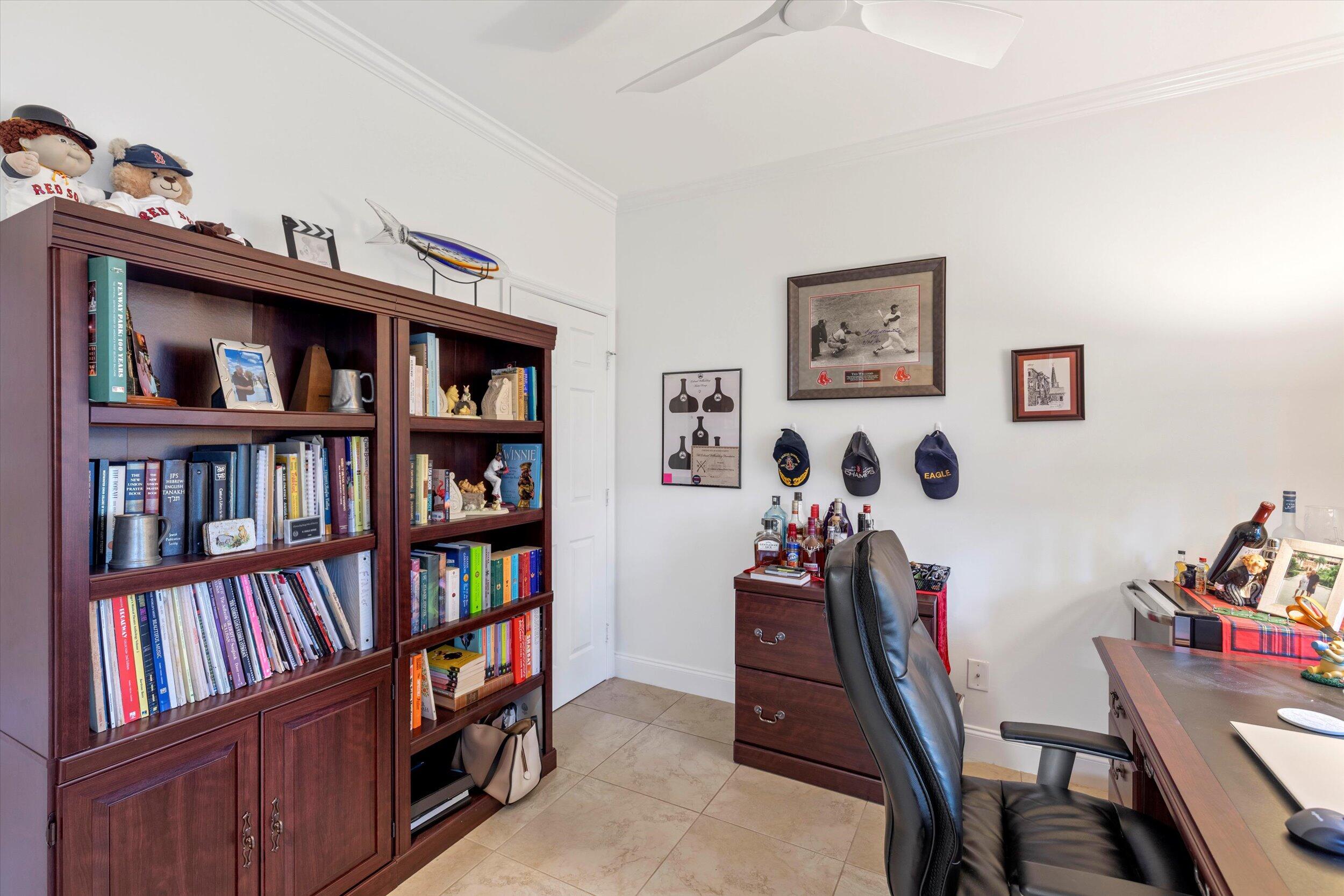 44 Spoonbill Way, Unit 1 Key West, FL 33040 - Photo 24 of 83 a view of a workspace with bookshelf
