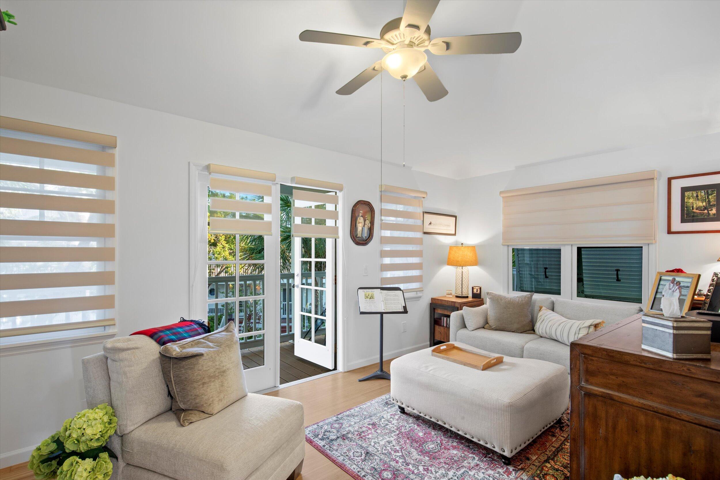 44 Spoonbill Way, Unit 1 Key West, FL 33040 - Photo 27 of 83 a living room with furniture and a large window