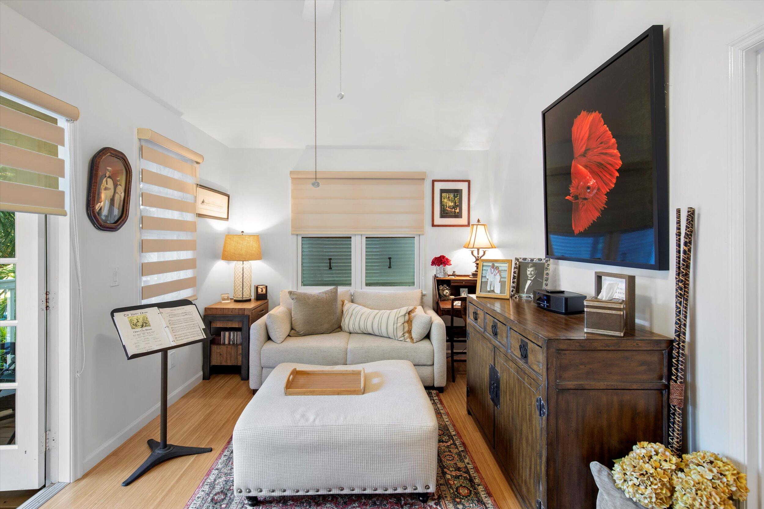 44 Spoonbill Way, Unit 1 Key West, FL 33040 - Photo 28 of 83 a living room with furniture and a large window