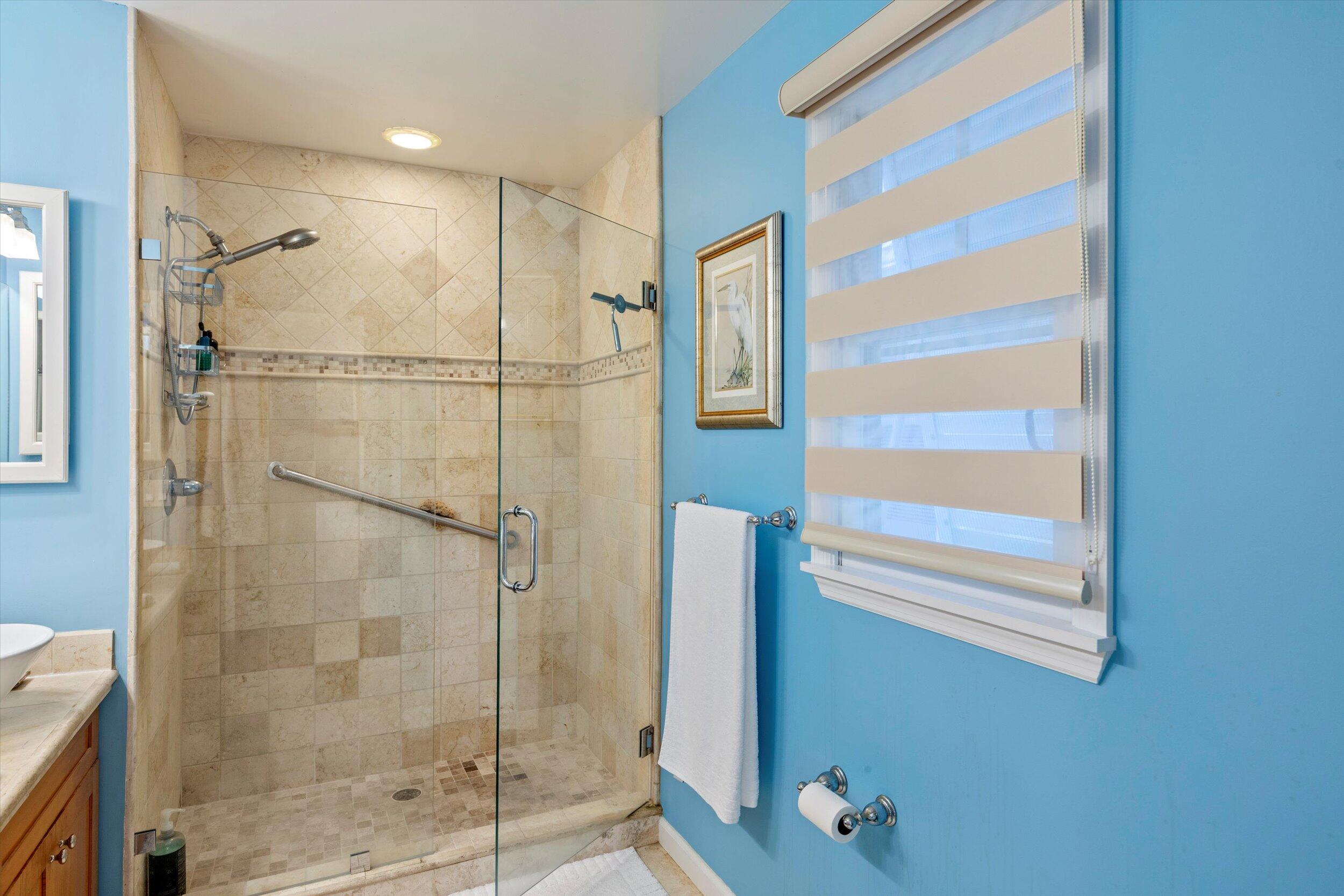 44 Spoonbill Way, Unit 1 Key West, FL 33040 - Photo 35 of 83 a bathroom with a shower and a sink