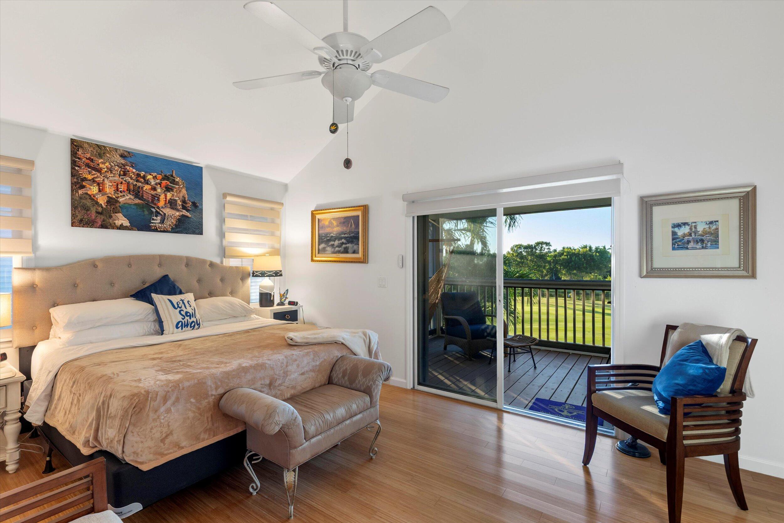 44 Spoonbill Way, Unit 1 Key West, FL 33040 - Photo 41 of 83 a spacious bedroom with a bed and a window