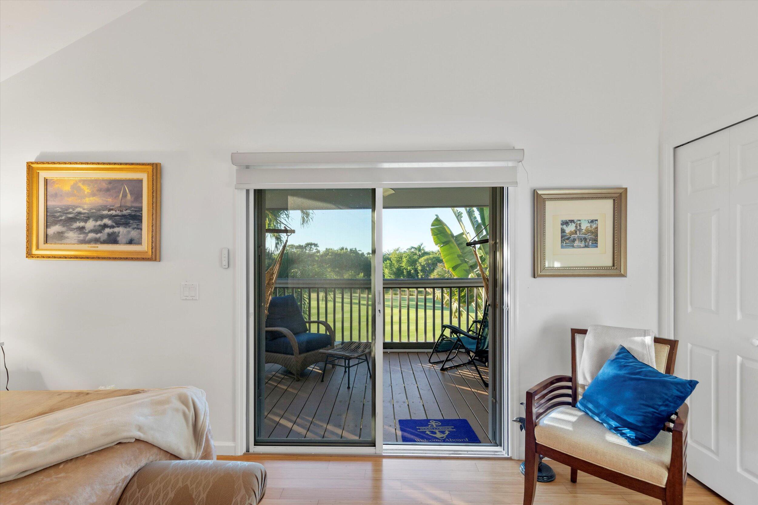 44 Spoonbill Way, Unit 1 Key West, FL 33040 - Photo 43 of 83 a living room with furniture and a window
