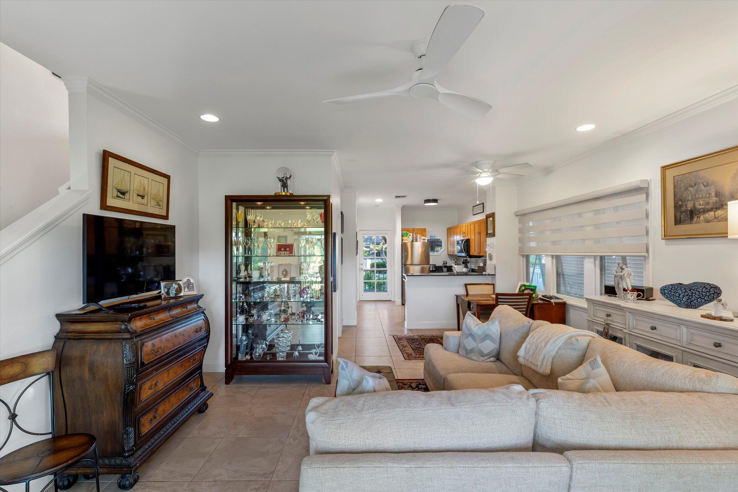 44 Spoonbill Way, Unit 1 Key West, FL 33040 - Photo 9 of 83 a living room with furniture and a flat screen tv