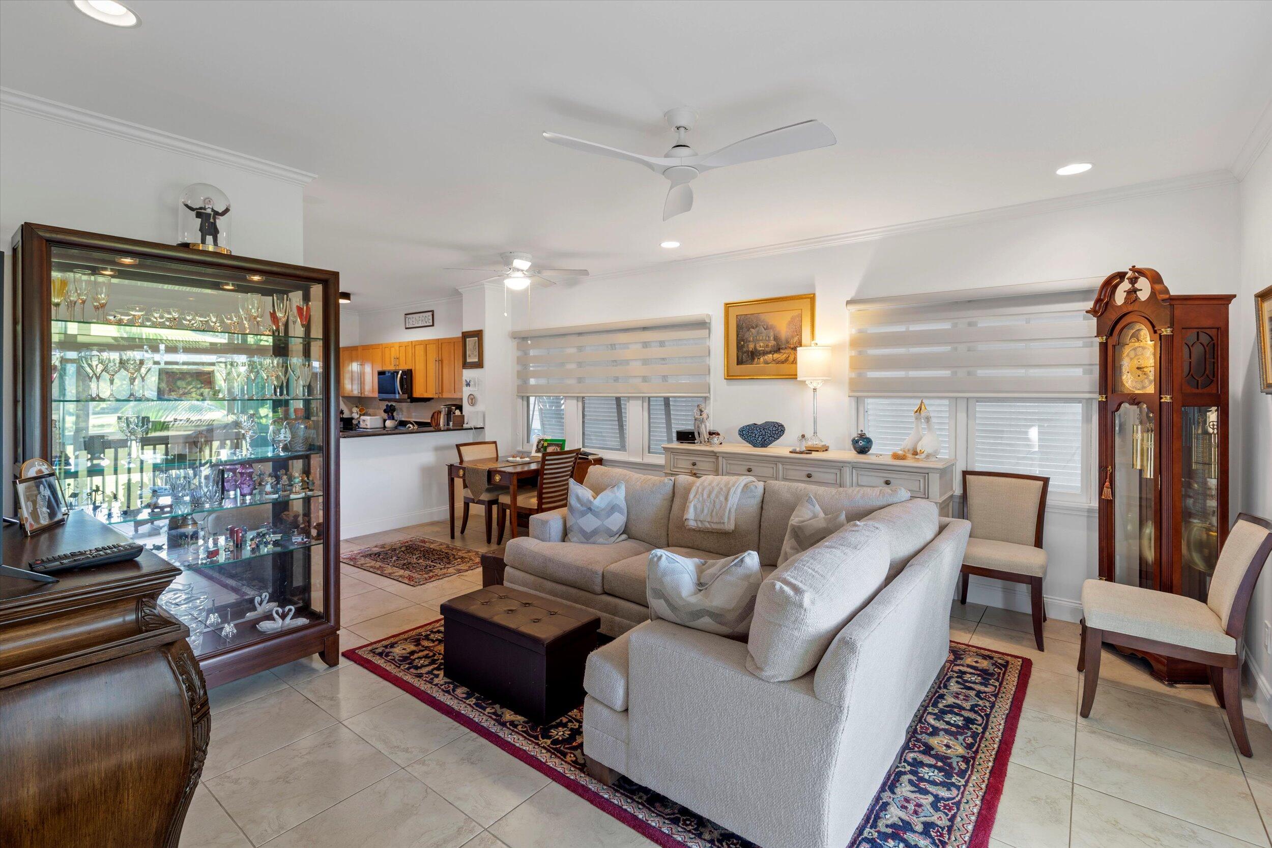 44 Spoonbill Way, Unit 1 Key West, FL 33040 - Photo 10 of 83 a living room with furniture and a flat screen tv