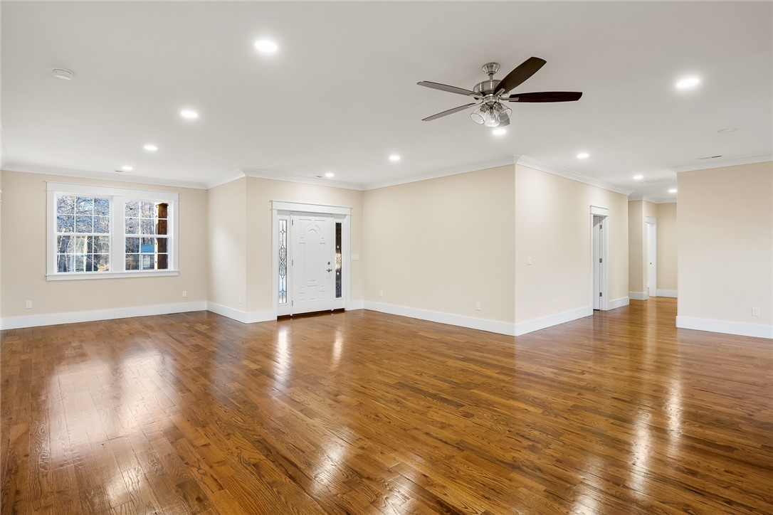 303 Regency Circle Anderson, SC 29625 - Photo 3 of 50 This expansive space showcases gleaming hardwood floors and ample natural light, perfect for gracious living.