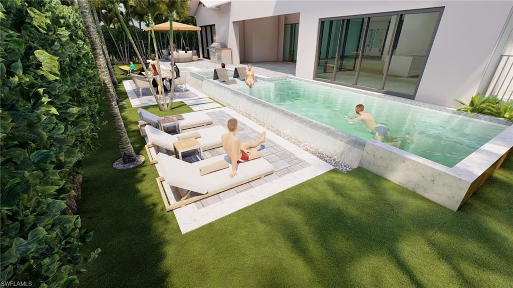 565 Whispering Pine Lane Naples, FL 34103 - Photo 11 of 12 a view of backyard with swimming pool and outdoor seating