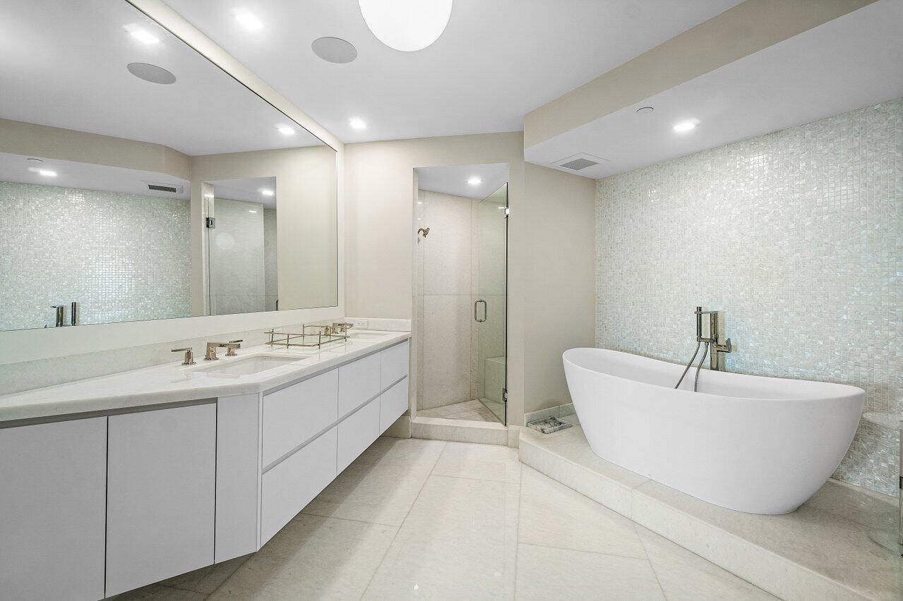 3720 South Ocean Boulevard, Unit 603 Highland Beach, FL 33487 - Photo 32 of 67 RENOVATED PRIMARY BATHROOM