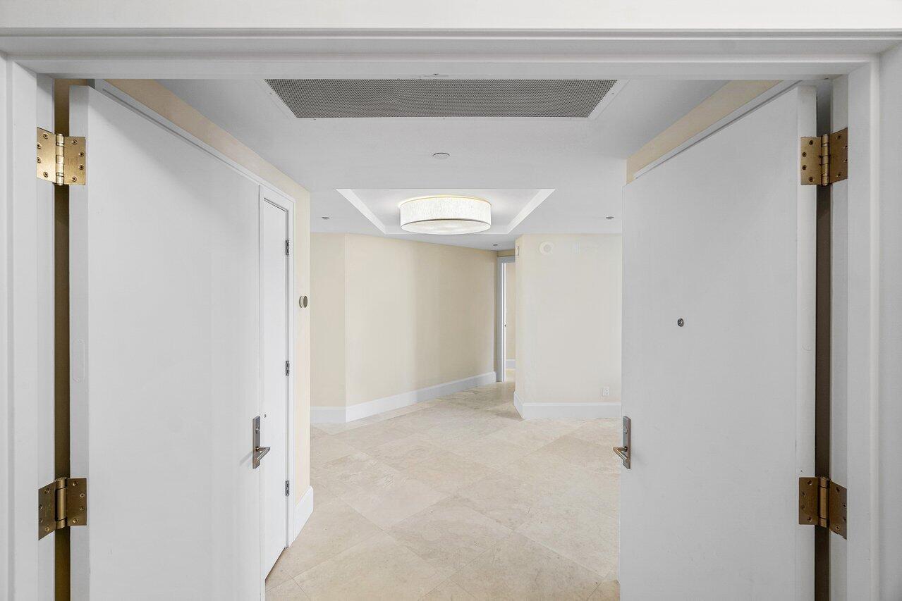 3720 South Ocean Boulevard, Unit 603 Highland Beach, FL 33487 - Photo 41 of 67 DOUBLE DOOR ENTRANCE